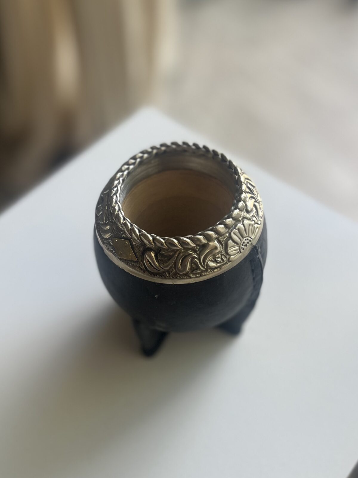 Torpedo Imperial calabaza forrado en cuero negro.